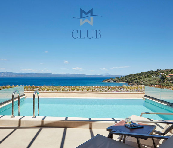 Club Sea View Private Pool sunbeds and the pool