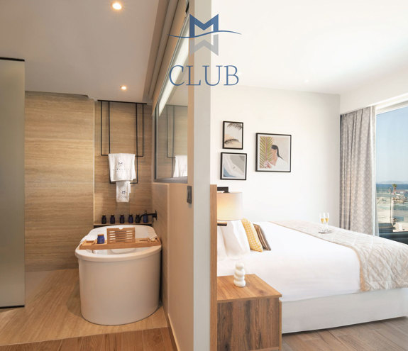 Miraggio Duplex Private Pool Suite bathtub and bed