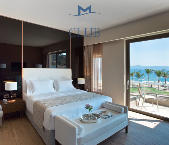Duplex Sea View Private Pool Suite bed, decorations and balcony view